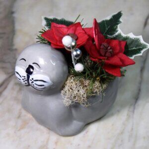Adorable small ceramic walrus planter w/ hand-painted Sola wood pointsettias